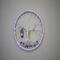 front view purple owl charm adorned tree of life wrapped in lavender color yarn